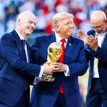Donald Trump presented the trophy to boos from the public