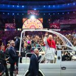 The Pope welcomed like a rock star at the Stade de France